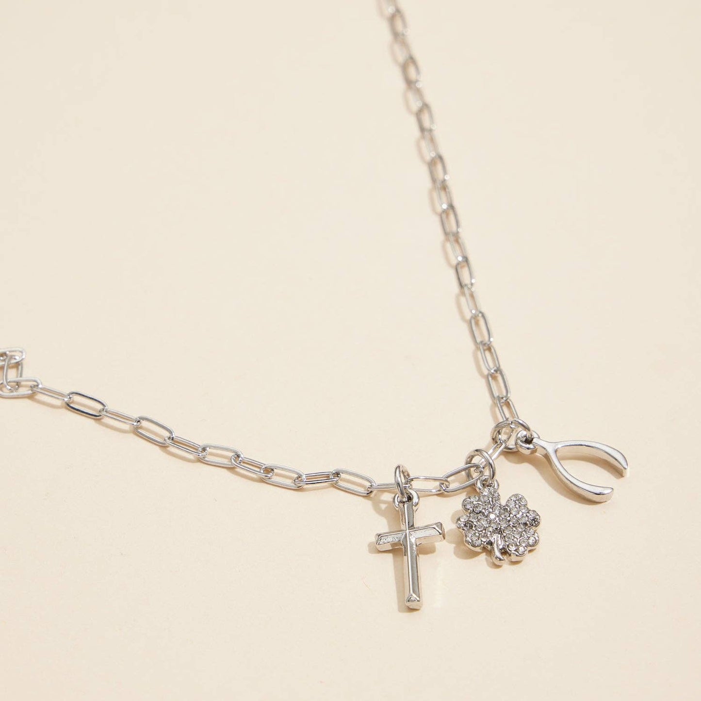 Gold Dipped Charm Necklace with Cross, Clover, and Wishbone